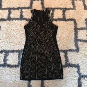 Never worn! Fitted little black dress with flair!